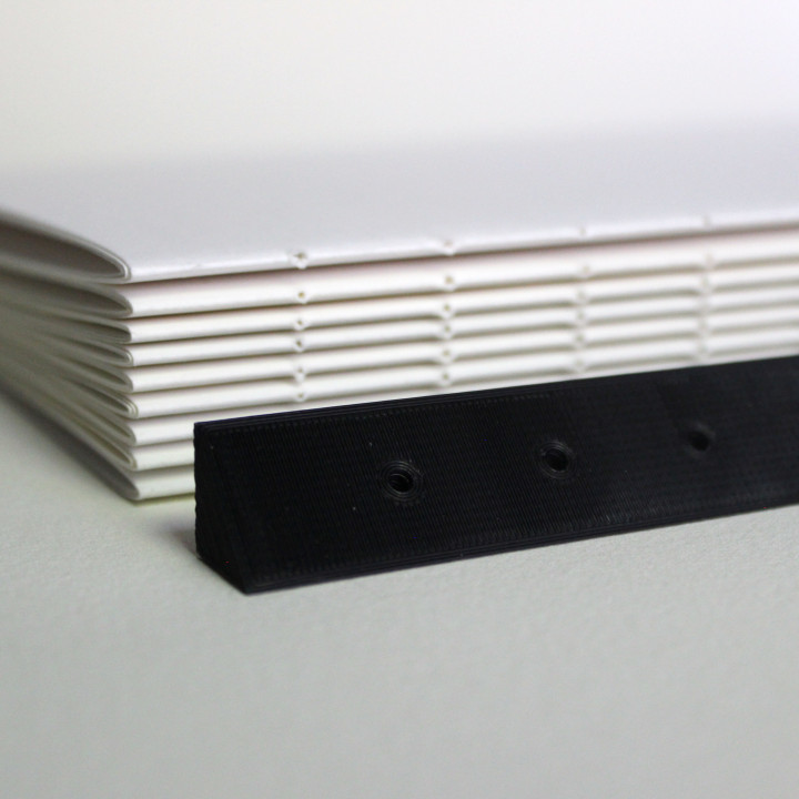 3D Printable Modifiable Bookbinding Awl Guide and Cradle by anna