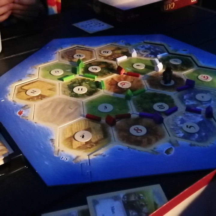 Catan Seafarers expansion pack pieces with a piece holder image