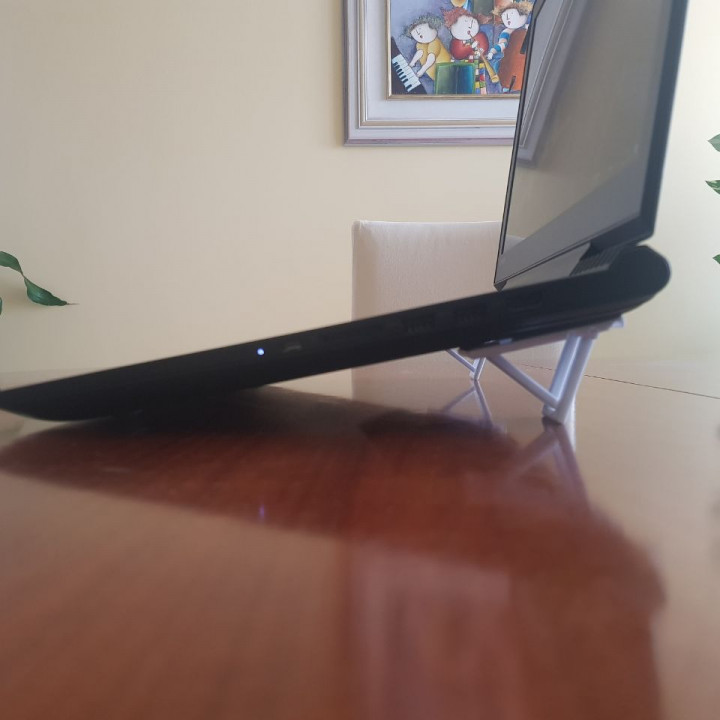 Integrated laptop riser/stand image