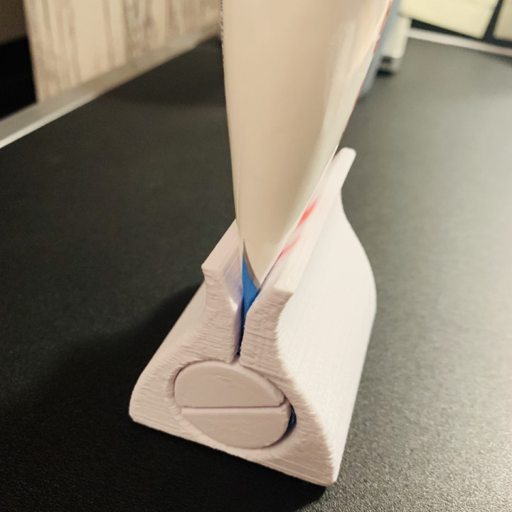 Toothpaste support clamp image