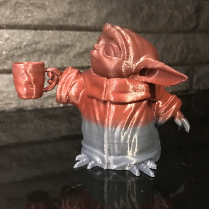 Baby Yoda with coffee cup image