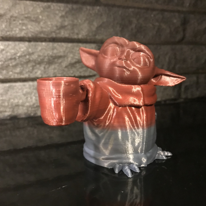 Baby Yoda with coffee cup image
