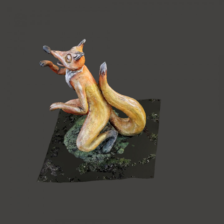 Wooden sculpture of a Fox image