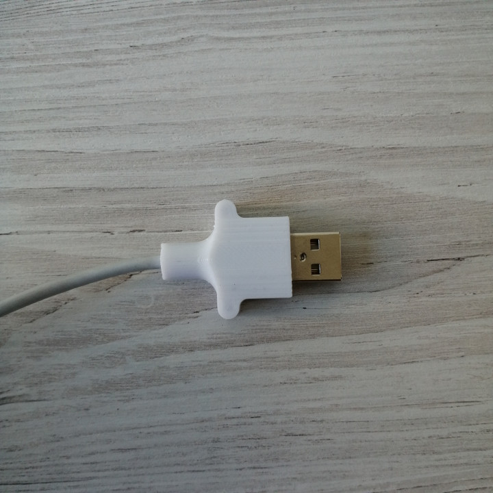 USB cable fixer image