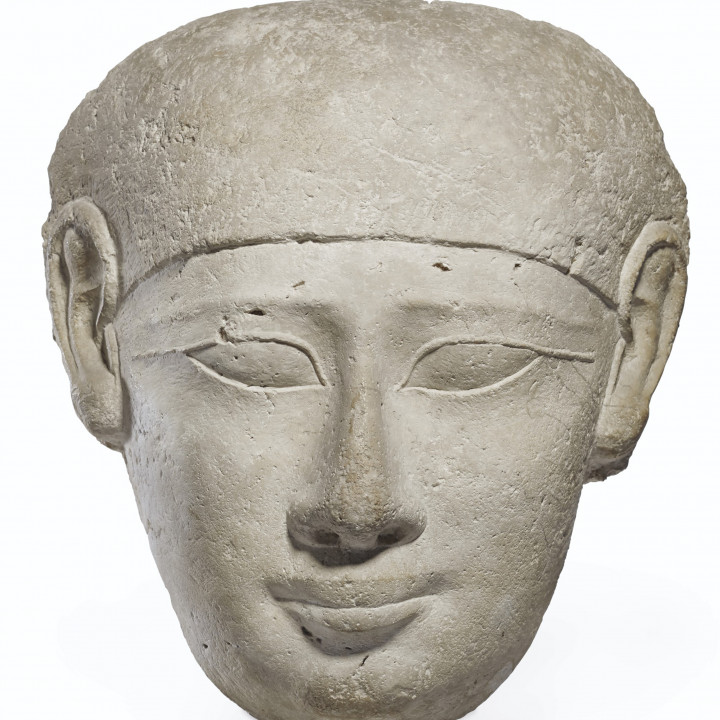 Egyptian Limestone Head from a Sarcophagus Lid image