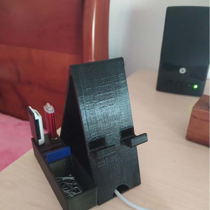 Phone stand with accessories space image